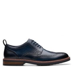 Półbuty Clarks. Niebieskie eleganckie półbuty męskie Clarks, wizytowe, bez obcasa, bez zapięcia. Za 409.99 zł.