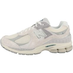 Buty do chodzenia dla dorosłych New Balance 2002R Linen. Szare buty do biegania męskie New Balance, bez wzorów, z materiału, bez zapięcia, do biegania. W wyprzedaży za 552.10 zł.