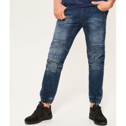 Denimowe joggery z biker panelami - Niebieski. Niebieskie jeansy męskie House, z jeansu. Za 129.99 zł.