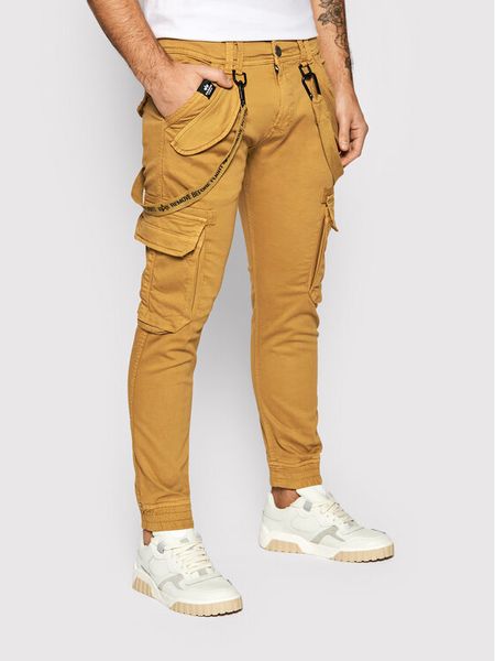 Alpha Industries Spodnie materiałowe Utility 128202 Brązowy Slim Fit. Brązowe spodnie na co dzień męskie Alpha Industries, bez wzorów, z bawełny. Za 349.00 zł.