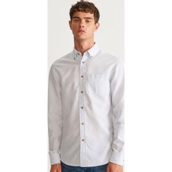 Koszula slim fit z bawełny organicznej - Biały. Białe koszule męskie Reserved, z bawełny. Za 69.99 zł.