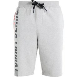 Tommy Jeans VINTAGE GRAPHIC BASKETBALL Spodnie treningowe light grey heather. Spodnie dresowe męskie Tommy Jeans. Za 349.00 zł.