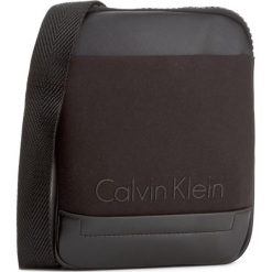 Saszetka CALVIN KLEIN - Caillou Mini Flat Cr K50K502829 001. Saszetki męskie marki Calvin Klein. W wyprzedaży za 209.00 zł.