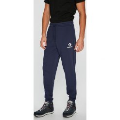 Converse - Spodnie. Szare spodnie na co dzień męskie Converse, z bawełny, casualowe. W wyprzedaży za 159.90 zł.