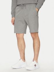 Tommy Hilfiger Szorty sportowe Essential MW0MW37240 Szary Regular Fit. Szare szorty sportowe męskie Tommy Hilfiger, bez wzorów, z bawełny, sportowe. Za 219.99 zł.