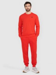 4F Spodnie dresowe joggery męskie - czerwone M. Czerwone spodnie dresowe męskie 4f, bez wzorów, z bawełny. W wyprzedaży za 79.99 zł.