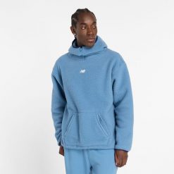 Bluza męska New Balance MT44584HEB – niebieska. Niebieskie bluzy z kapturem męskie New Balance, m, z aplikacjami, z materiału, z kapturem. Za 169.99 zł.