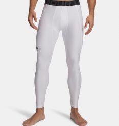Under Armour UA HG ARMOUR LEGGINGS Legginsy męskie. Białe legginsy męskie Under Armour, l, bez wzorów, z elastanu, na fitness i siłownię. W wyprzedaży za 125.99 zł.