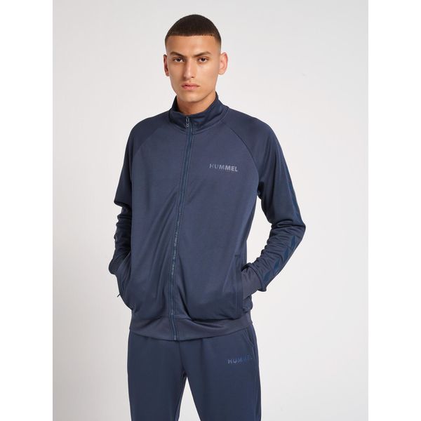 Bluza do piłki ręcznej męska Hummel Poly Zip. Niebieskie bluzy nierozpinane męskie HUMMEL, l, bez wzorów, sportowe, bez ramiączek, bez kaptura. W wyprzedaży za 125.35 zł.