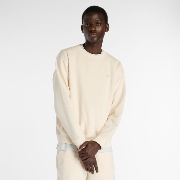 Bluza męska New Balance MT41506PEF – beżowa. Brązowe bluzy nierozpinane męskie New Balance, m, z aplikacjami, z bawełny, klasyczne, bez ramiączek, bez kaptura. Za 359.99 zł.