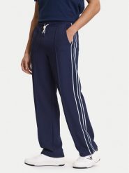 Guess Spodnie dresowe Z6GB14 K3211 Granatowy Regular Fit. Niebieskie spodnie dresowe męskie Guess, z aplikacjami, z dresówki. Za 519.99 zł.