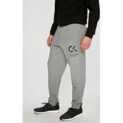 Calvin Klein Performance - Spodnie. Szare długie spodnie sportowe męskie Calvin Klein Performance, z bawełny. Za 269.90 zł.