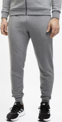 Under Armour Spodnie męskie Under Armour Rival Fleece Joggers szare 1379774 025 M. Szare długie spodnie sportowe męskie Under Armour, bez wzorów. Za 235.99 zł.