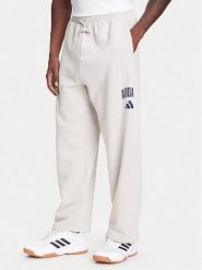 Adidas Spodnie dresowe Collegiate JM9177 Beżowy Regular Fit. Brązowe spodnie dresowe męskie ADIDAS, bez wzorów, z bawełny. Za 179.99 zł.