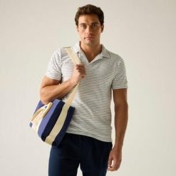 Męska koszulka polo Hadvo z odkrytym dekoltem. Białe koszulki polo męskie Regatta, na lato, m, bez wzorów, z bawełny, eleganckie, bez kołnierzyka, bez ramiączek. Za 149.99 zł.