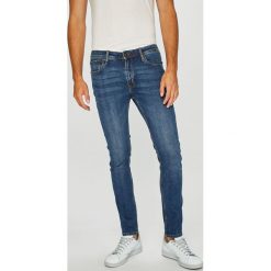 Jack & Jones - Jeansy Liam. Niebieskie jeansy męskie Jack & Jones, z aplikacjami, z bawełny. W wyprzedaży za 129.90 zł.