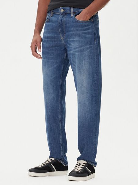 Guess Jeans Jeansy M5BA90 D002C Niebieski Tapered Fit. Niebieskie jeansy męskie Guess Jeans, z aplikacjami, z bawełny. Za 309.99 zł.