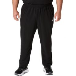 Spodnie dresowe Asics Core woven. Czarne spodnie dresowe męskie Asics, bez wzorów, z dresówki. Za 272.00 zł.