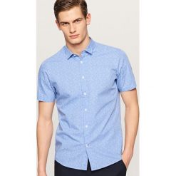 Koszula z mikroprintem slim fit - Niebieski. Niebieskie koszule męskie Reserved. Za 69.99 zł.