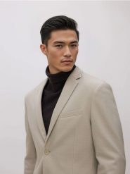 Marynarka slim fit - beżowy. Brązowe marynarki męskie Reserved, l, bez wzorów, z dzianiny. Za 259.99 zł.