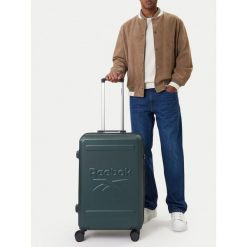 Walizka średnia Reebok. Zielone walizki męskie Reebok, bez wzorów, średnie. Za 299.99 zł.