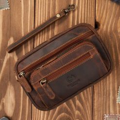 Saszetka męska brązowa skórzana do ręki vintage Paolo Peruzzi T-130-HBR. Brązowe saszetki męskie bez wzorów, ze skóry. Za 129.00 zł.