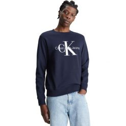 Bluza Calvin Klein Core Monogram, Mężczyźni. Niebieskie bluzy nierozpinane męskie Calvin Klein, m, bez wzorów, z bawełny, bez ramiączek, bez kaptura. Za 490.00 zł.