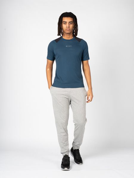 Champion T-Shirt "Tech-Tee" | 218011 | Mężczyzna | Czarny, Niebieski. Czarne t-shirty męskie CHAMPION, m, bez wzorów, z poliesteru, bez kołnierzyka, bez ramiączek. W wyprzedaży za 89.00 zł.