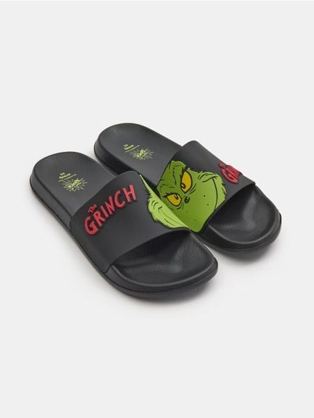 Klapki Grinch - czarny. Czarne klapki i japonki męskie Sinsay, bez wzorów. Za 39.99 zł.