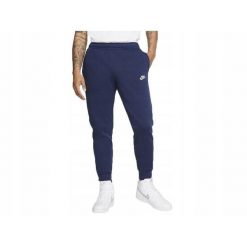 Spodnie dresowe męskie NIKE SPORTSWEAR CLUB FLEECE bawełniane. Niebieskie spodnie dresowe męskie Nike, bez wzorów, z bawełny, długie. Za 249.99 zł.