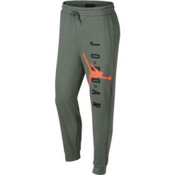 Jordan Spodnie męskie Jumpman Air Lightweight Vintage Lichen/Hyper Crimson r. S (AR0031-351). Długie spodnie sportowe męskie marki Jordan. Za 468.16 zł.