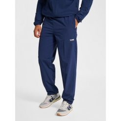 Spodnie dresowe Hummel Pulse. Niebieskie spodnie dresowe męskie HUMMEL, bez wzorów, z dresówki. Za 278.50 zł.