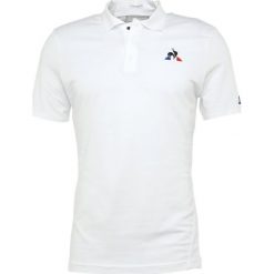 Le coq sportif TENNIS Koszulka polo new optical white. Białe koszulki polo męskie le coq sportif, z bawełny, sportowe, polo. Za 369.00 zł.