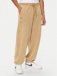 Under Armour Spodnie dresowe UA Icon 1386554 Beżowy Loose Fit. Brązowe spodnie dresowe męskie Under Armour, bez wzorów, z bawełny. Za 249.99 zł.