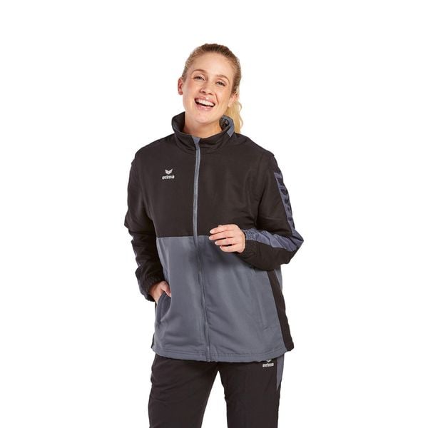 Kurtka Erima Six Wings. Czarne kurtki męskie Erima, m, bez wzorów, z polaru, bez ramiączek, z kapturem. W wyprzedaży za 310.50 zł.