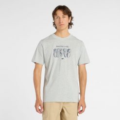 Koszulka męska New Balance MT61778SAG – szara. Szare t-shirty sportowe męskie New Balance, m, z aplikacjami, z dresówki, klasyczne, bez ramiączek. Za 149.99 zł.