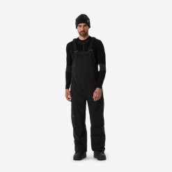 Spodnie snowboardowe ogrodniczki męskie Dreamscape SNB BIB 900. Brązowe spodnie narciarskie i snowboardowe męskie DREAMSCAPE, bez wzorów, z materiału, narciarskie. Za 799.99 zł.