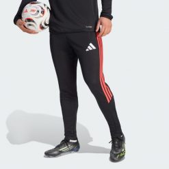 Spodnie treningowe Tiro26 League Regular. Czarne spodnie dresowe męskie ADIDAS, bez wzorów, z dresówki. Za 219.00 zł.