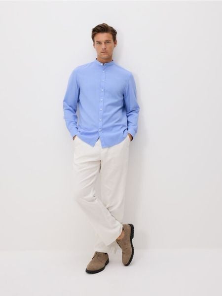Koszula regular z bawełny egipskiej - niebieski. Niebieskie koszule męskie Reserved, l, bez wzorów, z bawełny, bez kołnierzyka, bez ramiączek. W wyprzedaży za 89.99 zł.
