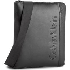 Saszetka CALVIN KLEIN - Elevated Logo Flat C K50K503537 001. Saszetki męskie Calvin Klein. W wyprzedaży za 259.00 zł.