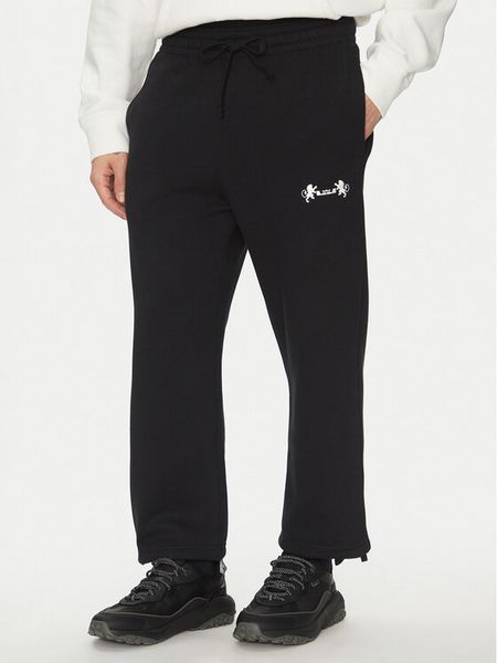 Nike Spodnie dresowe FB7127 Czarny Standard Fit. Czarne spodnie dresowe męskie Nike, bez wzorów, z bawełny. Za 369.99 zł.