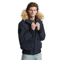 Kurtka z kapturem Superdry Everest. Niebieskie kurtki męskie Superdry., m, bez wzorów, z puchu, bez ramiączek, z kapturem. W wyprzedaży za 704.00 zł.