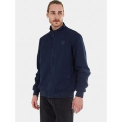 Kurtka przejściowa męska Fundango Harrington. Niebieskie kurtki męskie Fundango, m, bez wzorów, casualowe, bez ramiączek, bez kaptura. Za 379.90 zł.