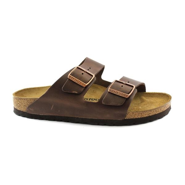 Klapki unisex Birkenstock Arizona. Brązowe klapki i japonki męskie Birkenstock, bez wzorów, z materiału. W wyprzedaży za 445.05 zł.
