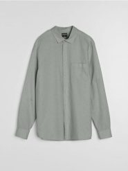 Bawełniana koszula z długim rękawem i kieszenią piersiową - zielony. Zielone koszule męskie Sinsay, l, bez wzorów, z bawełny, bez kołnierzyka, bez ramiączek. Za 59.99 zł.