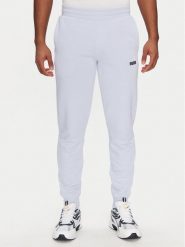 Puma Spodnie dresowe Ess 684714 Fioletowy Regular Fit. Fioletowe spodnie dresowe męskie Puma, bez wzorów, z bawełny. Za 129.99 zł.