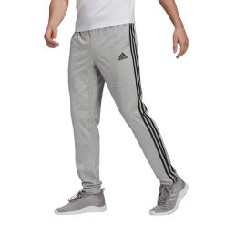 Spodnie męskie adidas Essentials Single. Czarne spodnie na co dzień męskie ADIDAS, bez wzorów, casualowe. Za 121.00 zł.