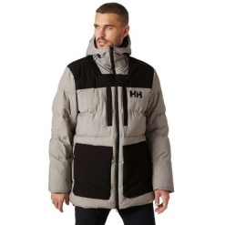 Kurtka puchowa Helly Hansen Patrol. Szare kurtki męskie Helly Hansen, bez wzorów, z puchu, sportowe, bez ramiączek, bez kaptura. W wyprzedaży za 1,415.00 zł.