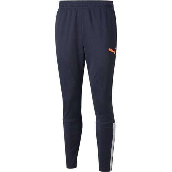 Spodnie Puma Teamliga Training Pants, Mężczyźni. Niebieskie długie spodnie sportowe męskie Puma, bez wzorów, do piłki nożnej. Za 128.95 zł.