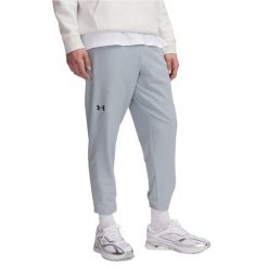 Spodnie treningowe męskie Under Armour Unstoppable Tapered. Niebieskie buty treningowe męskie Under Armour, bez wzorów, bez zapięcia, na fitness i siłownię. W wyprzedaży za 334.70 zł.